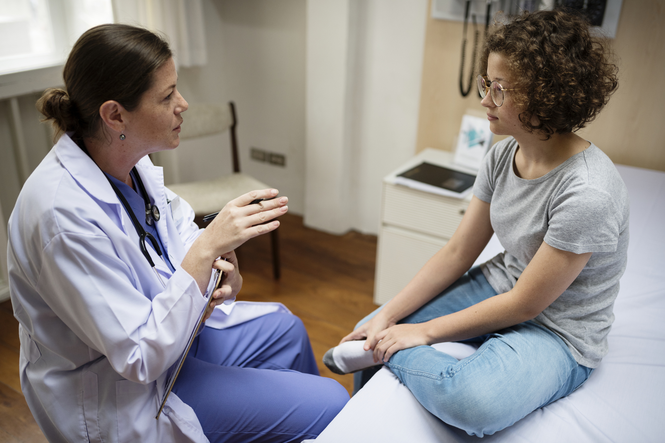 Doctor is checking a patient