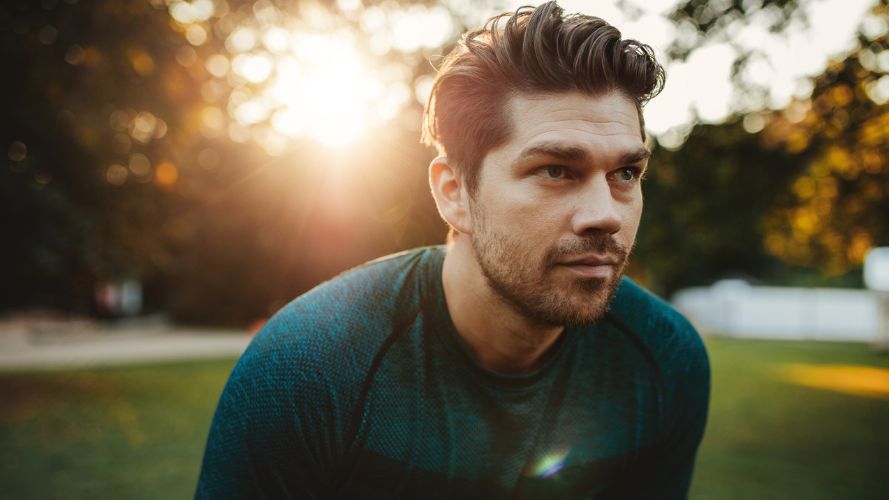 young-man-in-park-at-sunset