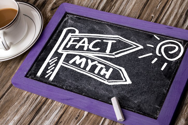 Small chalkboard next to coffee that reads "Fact or Myth"