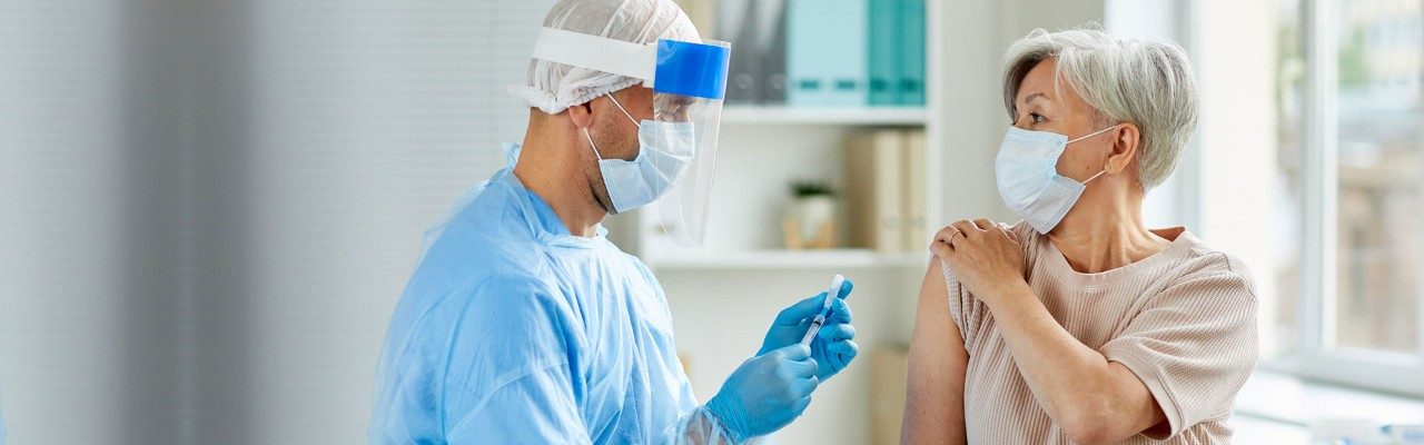 Male Nurse Preparing Injection