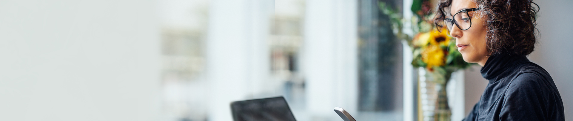 woman in phone and computer