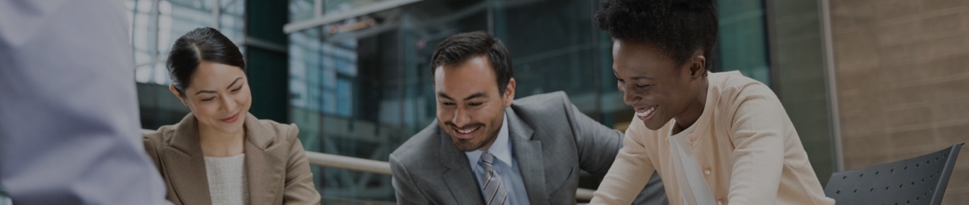 smiling colleagues in an office setting