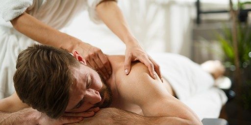 Man is getting massage therapy.