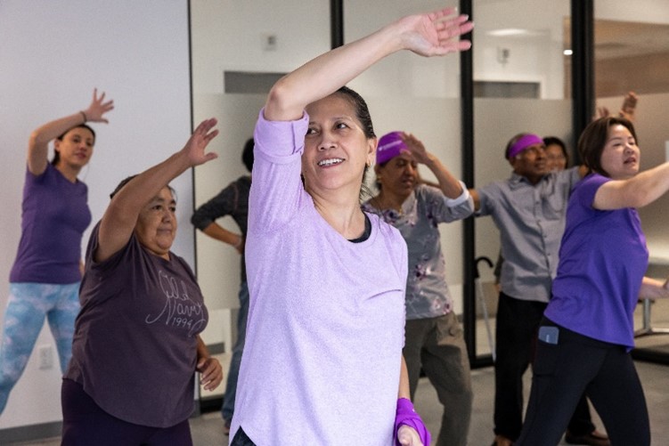 EmblemHealth members participating in a fitness class at the Elmhurst Neighborhood Care site located in Queens, New York