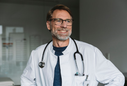 Young male doctor smiling