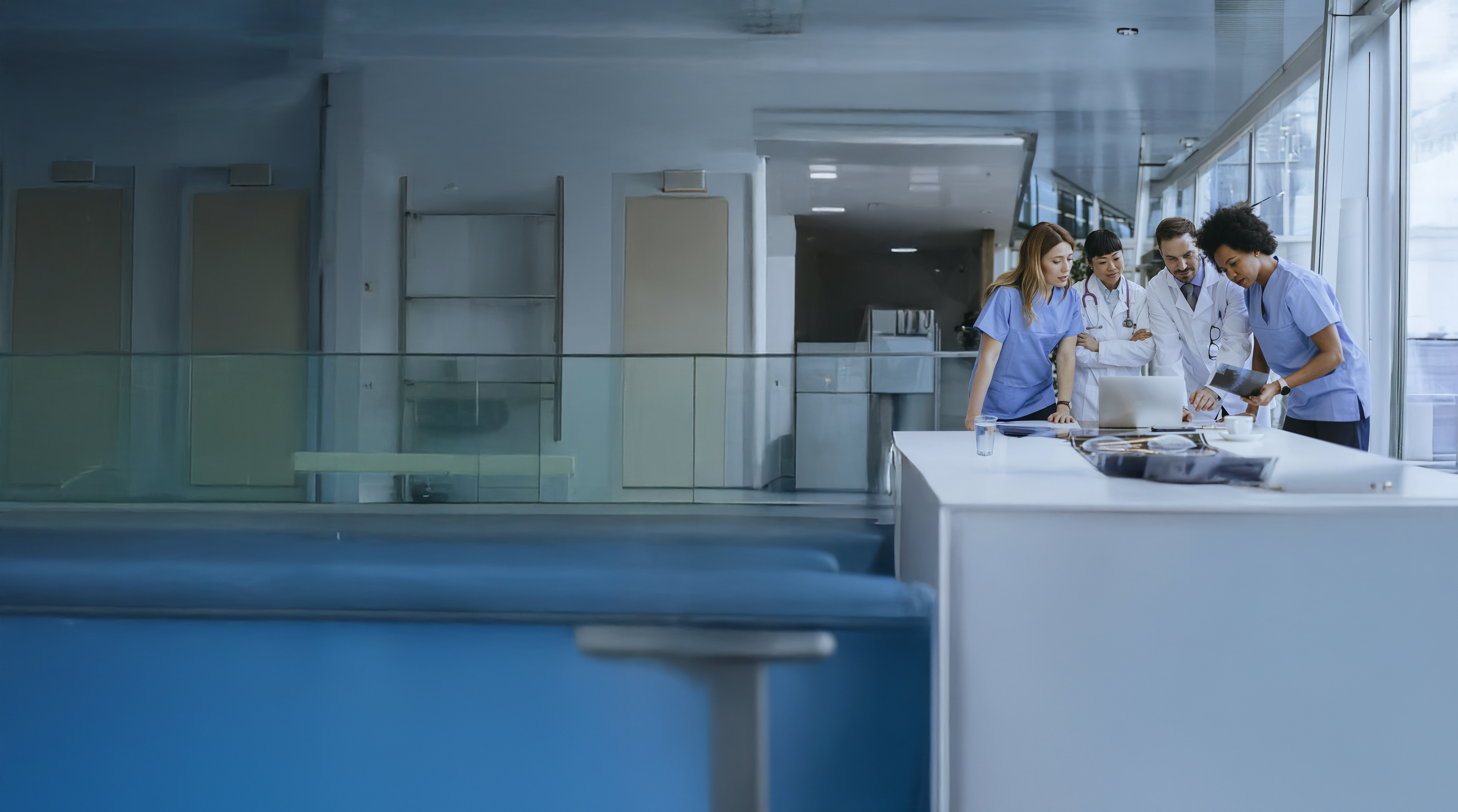 group of providers in health care around computer