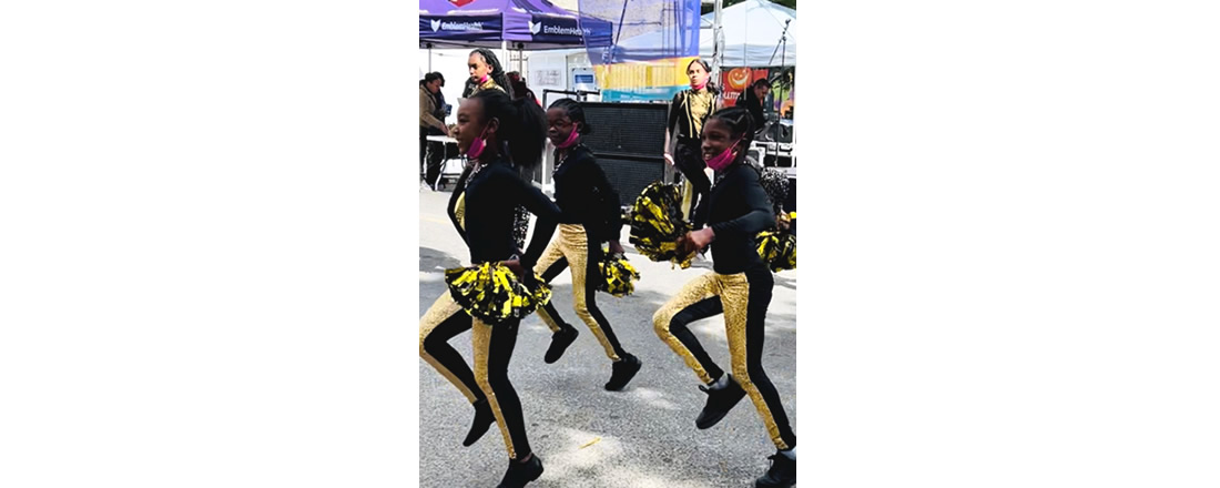 Members of the Victory Music and Dance Company perform before the crowd at the EmblemHealth Healthier Futures Health and Wellness Expo in Brooklyn