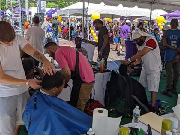 Bronx residents receiving free haircuts