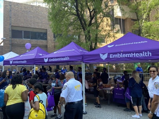 EmblemHealth team posing with NYPD members