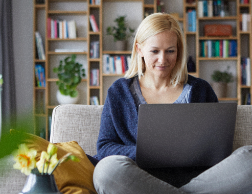 woman uses her computer